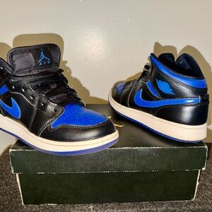 Jordan 1 Mid-Top Sneakers in Black and Blue